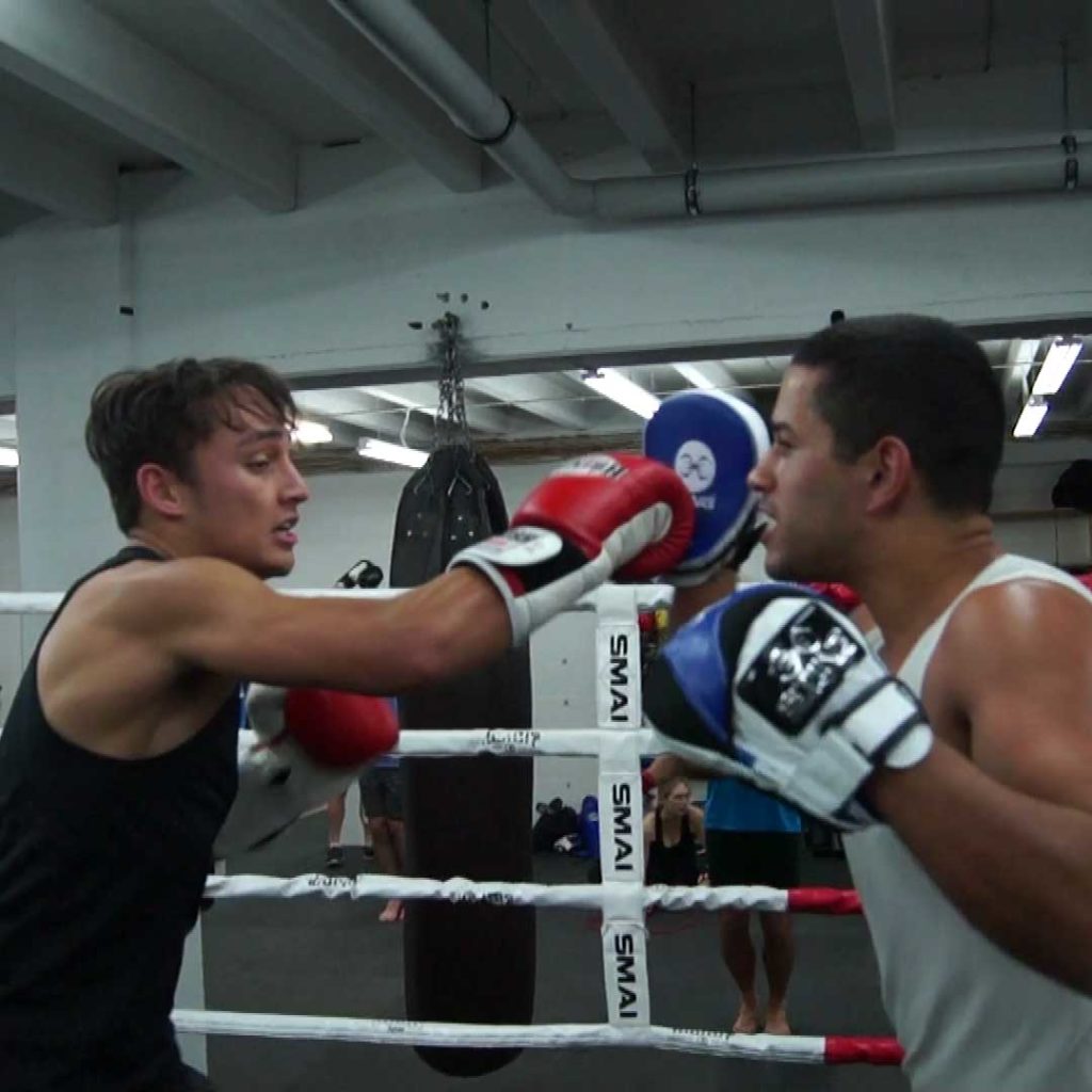 pad work with boxing coach